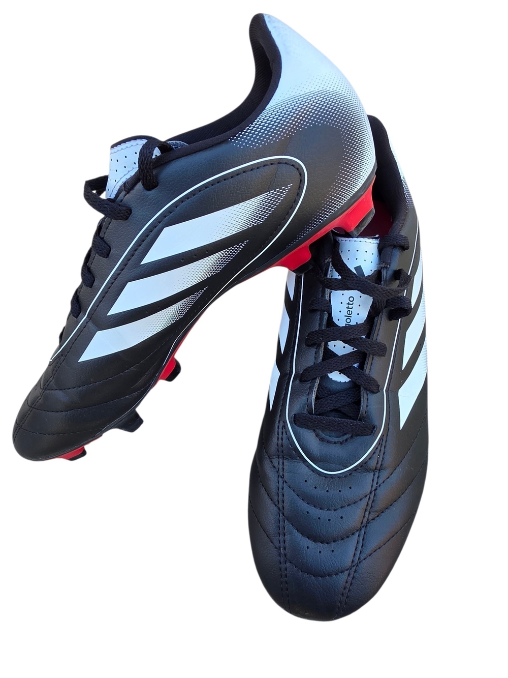 adidas Black and White Soccer Cleats with Red Stud Accents